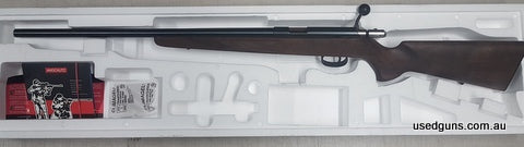 423937