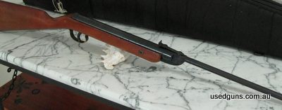 413836